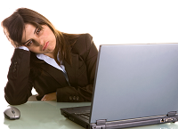 A woman sitting at a desk.