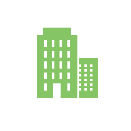 A green building icon on a white background.