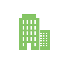 A green building icon on a white background.